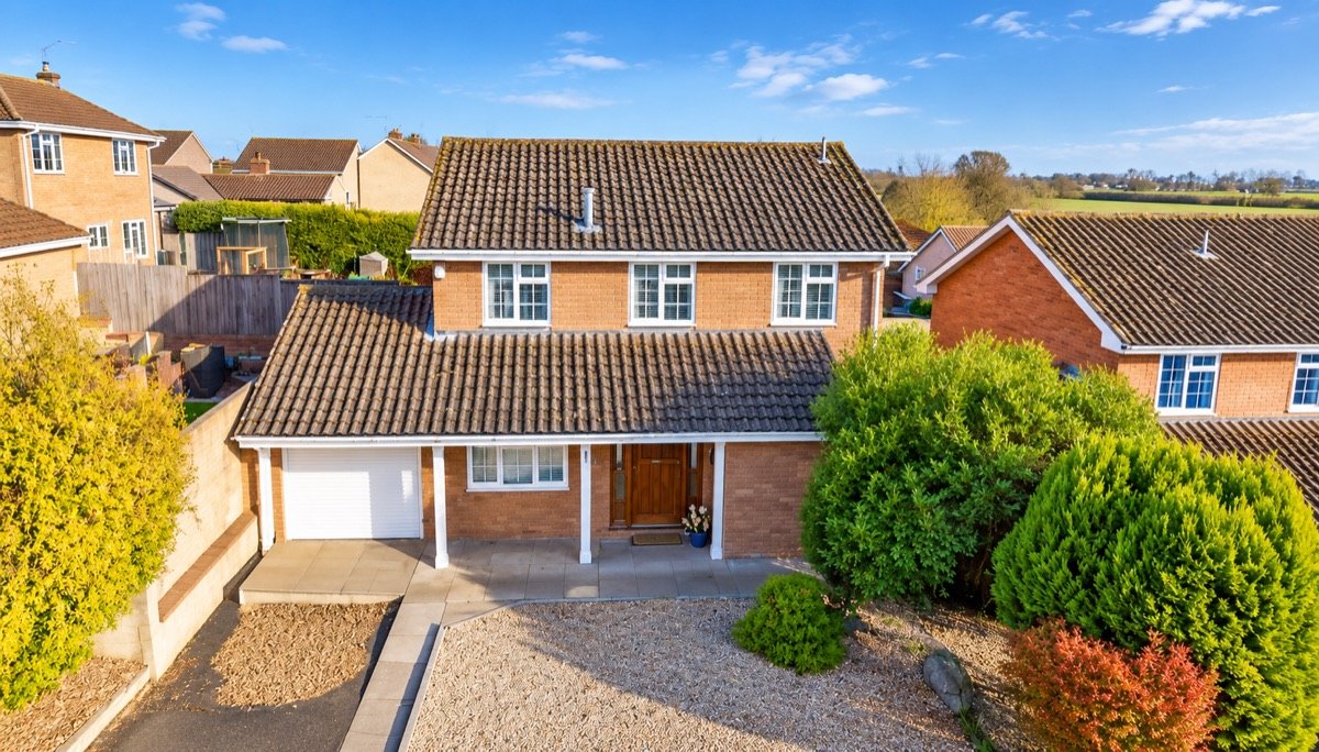 Drone photograph of a detached family home for an estate agent listing